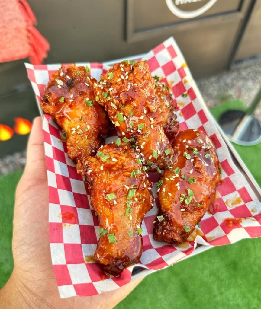 Birdside wings held outside the Katy food truck.